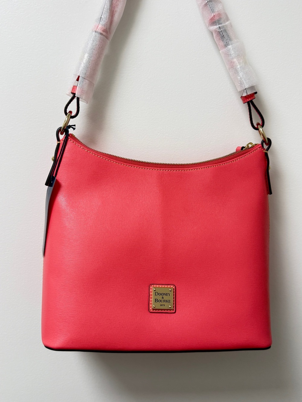 Dooney & Bourke Coral-Pink Leather Shoulder Bag with Gold Tone Logo